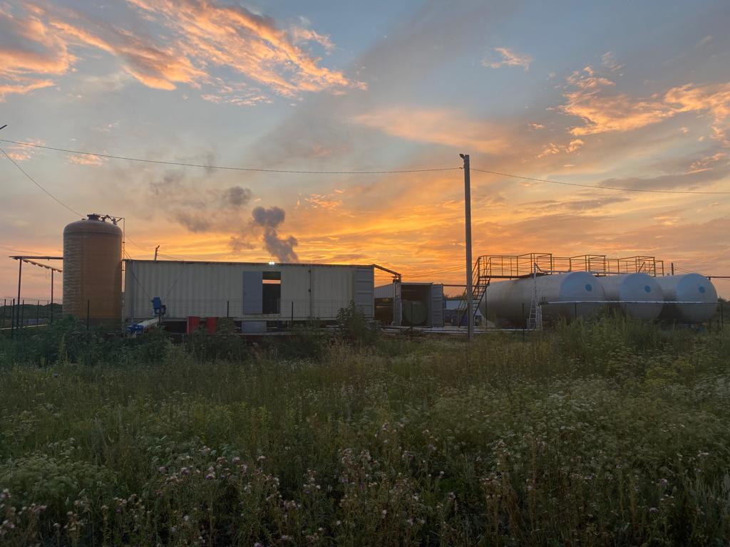 Industrial processing site at sunset