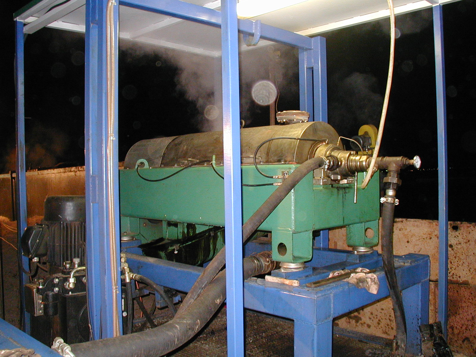 HydroPure tri-phase centrifuge installed in a processing frame